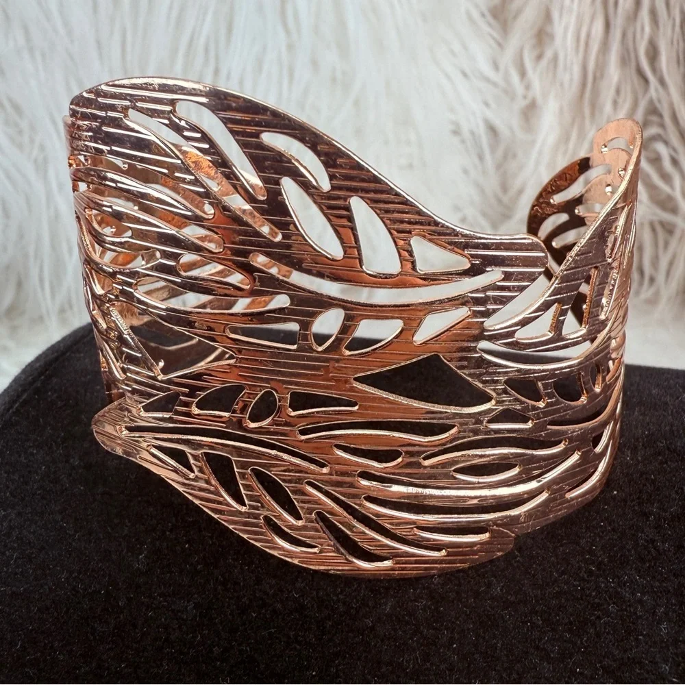 Gorgeous, lightweight rose goldtone, cut out cuff bracelet